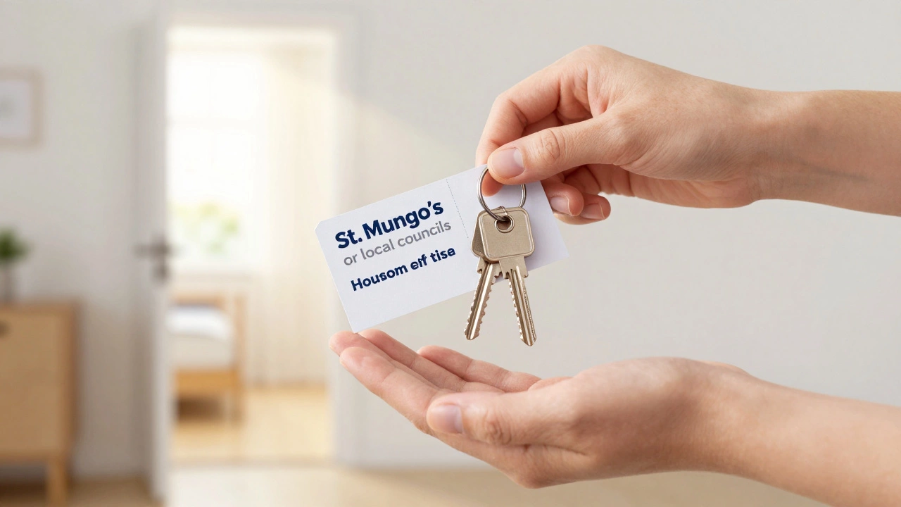 Hand receiving house keys and housing voucher, symbolizing shelter aid